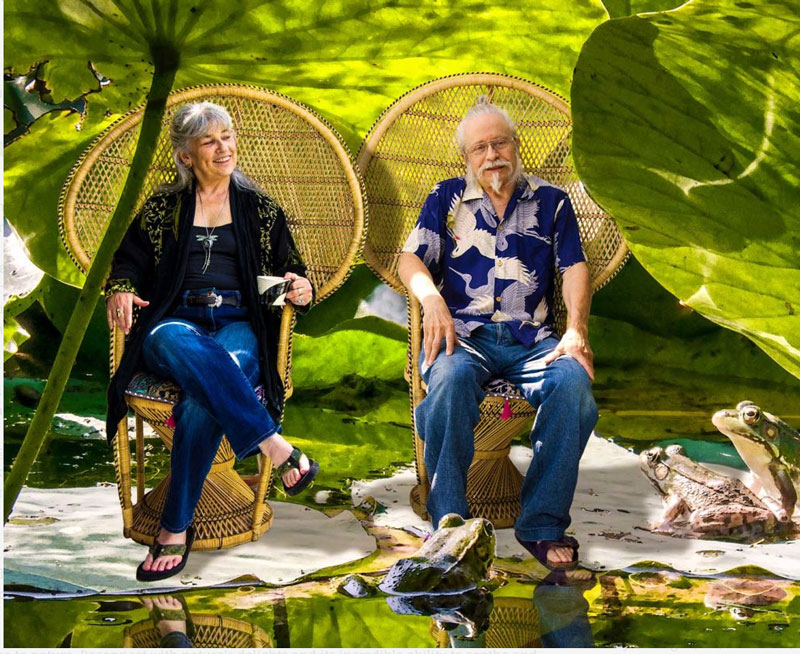 Dick and Rosanne, photographers, seated in their garden