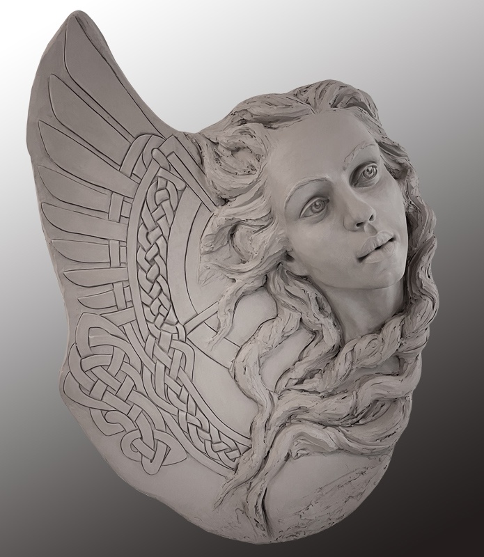 Angel for Ukraine, clay, 54" x 40" x 10". The sculpture will be cast in cement with a stainless steel base.